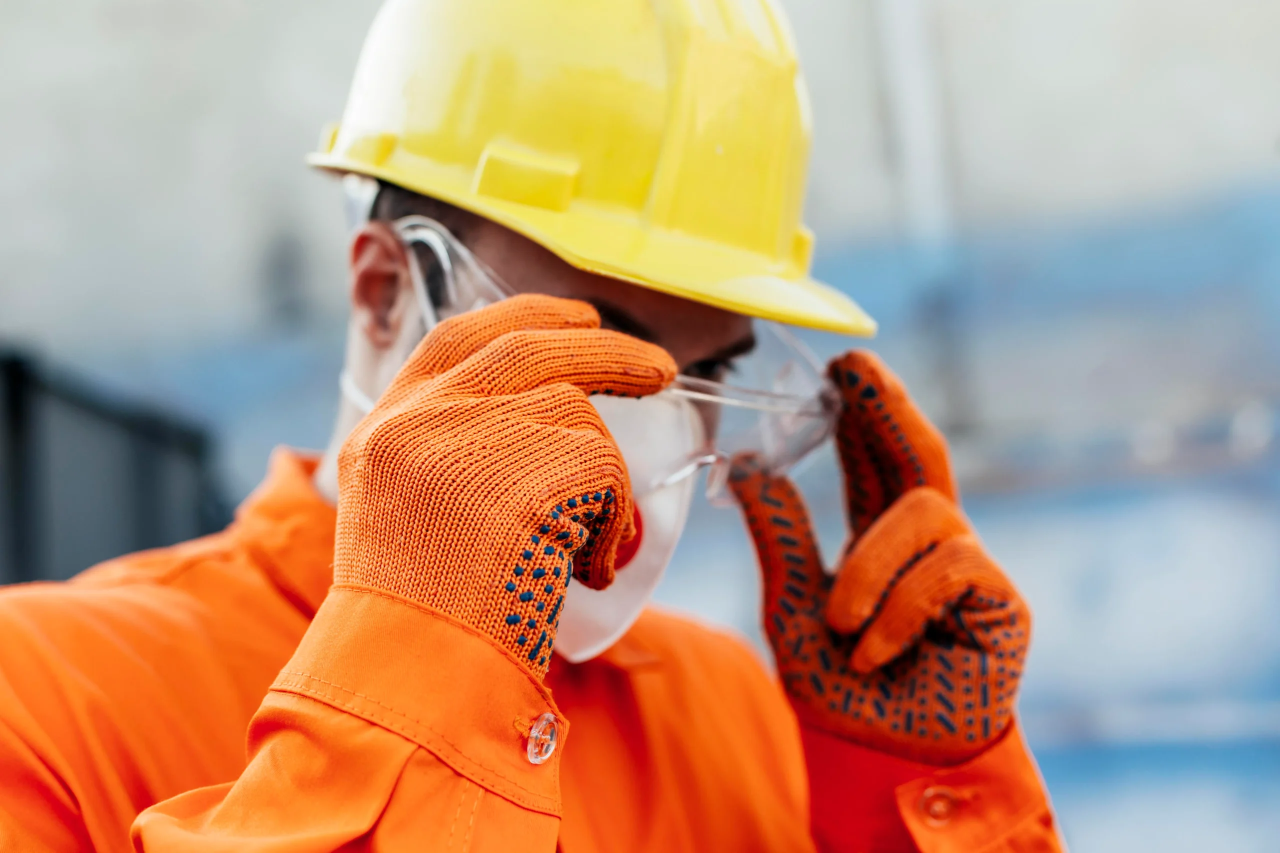 worker uniform with hard hat protective glasses